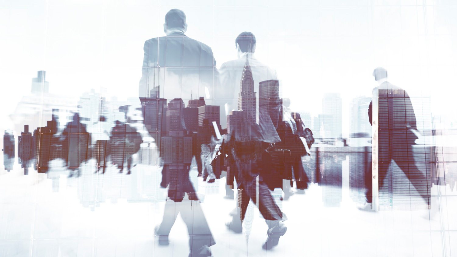 Business professionals walking in an urban setting, with a city skyline overlay.