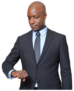 Attorney checking the time while standing in a professional office setting.