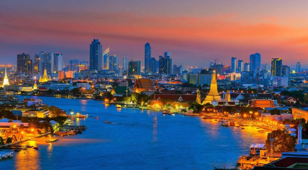 Home - Illuminated Buildings City Against Sky Sunset 11Zon - Global Law Experts