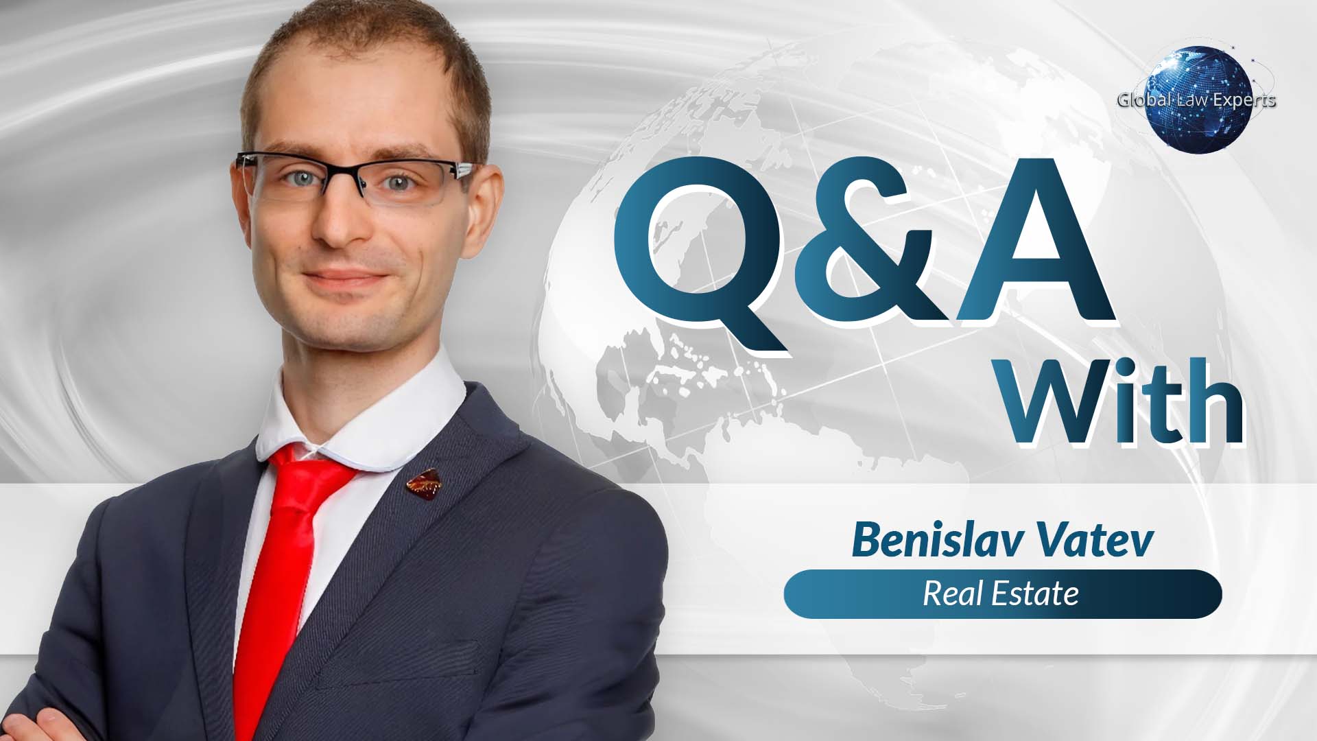 Legal professional in a suit smiling against a background featuring a global theme and text for a Q&A session.