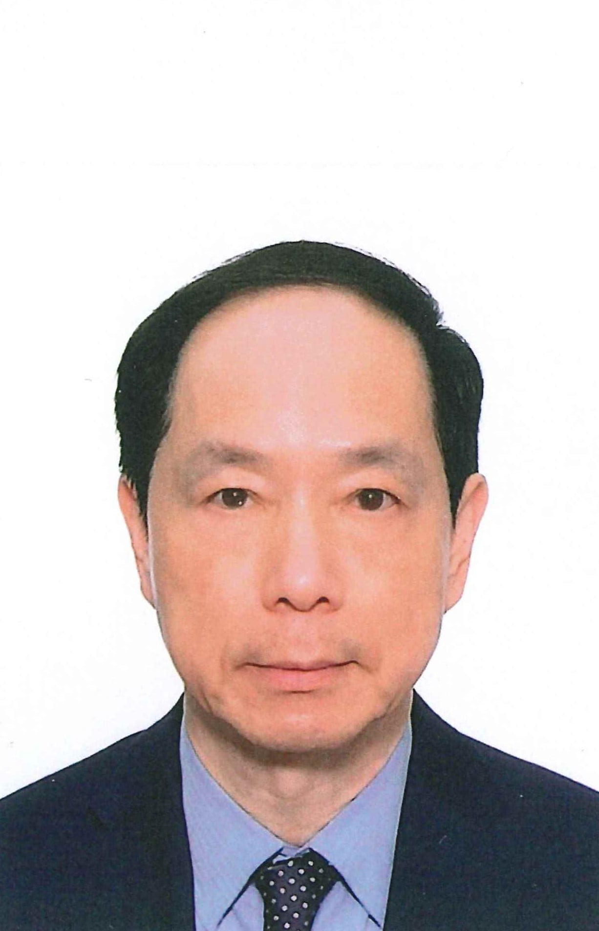 Legal professional portrait of an attorney in a suit with a neutral expression against a white background.